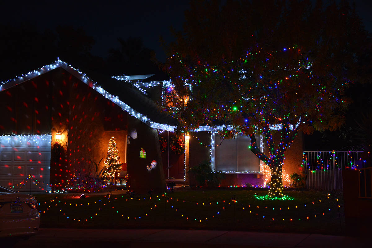 Celia Shortt Goodyear/Boulder City Review Multicolored twinkling lights and white dangling one ...