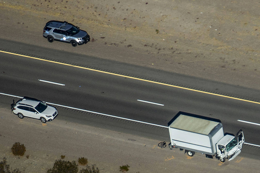 (L.E. Baskow/Las Vegas Review-Journal) A damaged box truck is pictured at the scene of a fatal ...