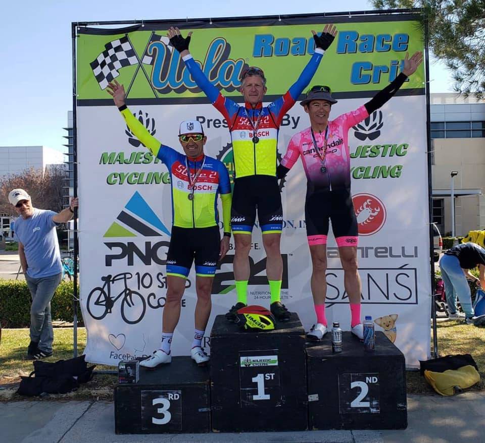 (Stage 2 Cycling Team) Michael Murray, left, on the race podium.