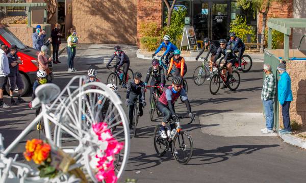 (L.E. Baskow/Las Vegas Review-Journal) Cyclist do a ride-by tribute during a vigil honoring the ...