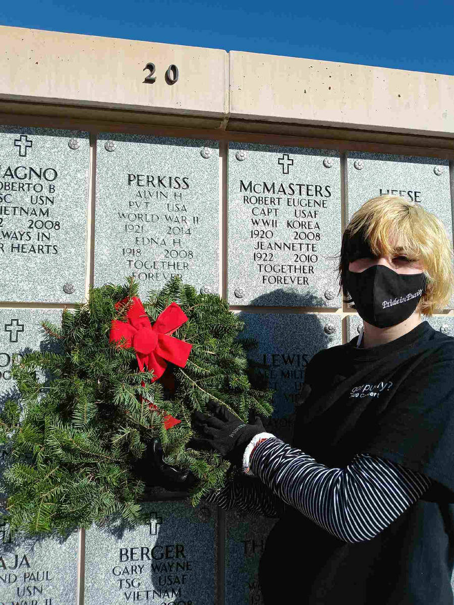 Denise Ashurst Pride in Purity volunteer Adisyn Neilson places a wreath at the final resting pl ...