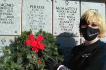 Denise Ashurst Pride in Purity volunteer Adisyn Neilson places a wreath at the final resting pl ...