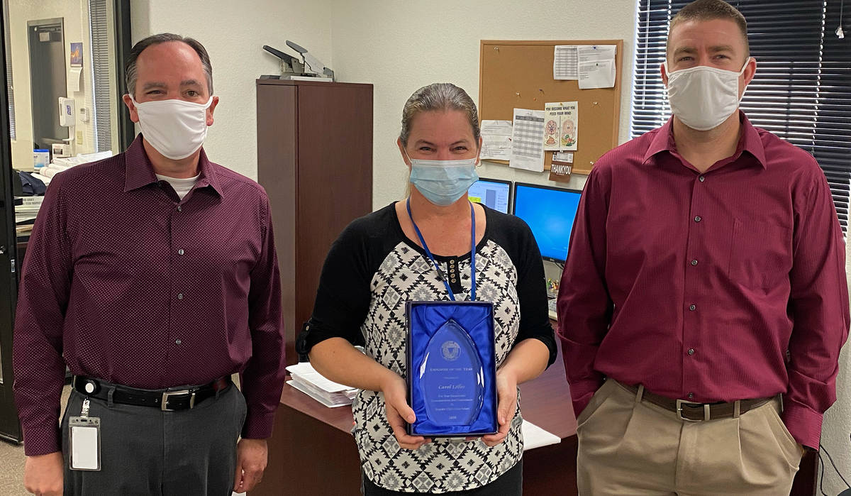 Boulder City Carol Lelles, center, was named Boulder City's employee of the year. Acting City M ...