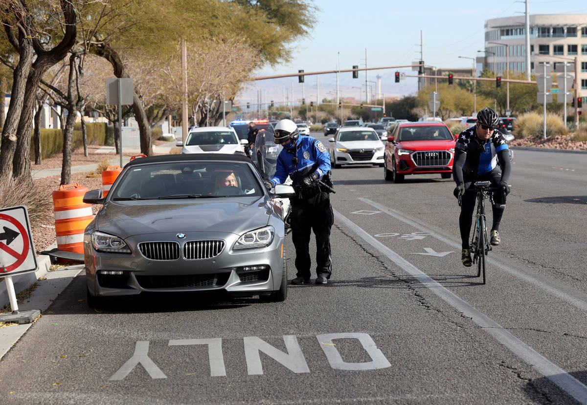 (K.M. Cannon/Las Vegas Review-Journal) Police officers, including a North Las Vegas Police offi ...