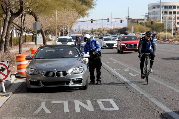 (K.M. Cannon/Las Vegas Review-Journal) Police officers, including a North Las Vegas Police offi ...