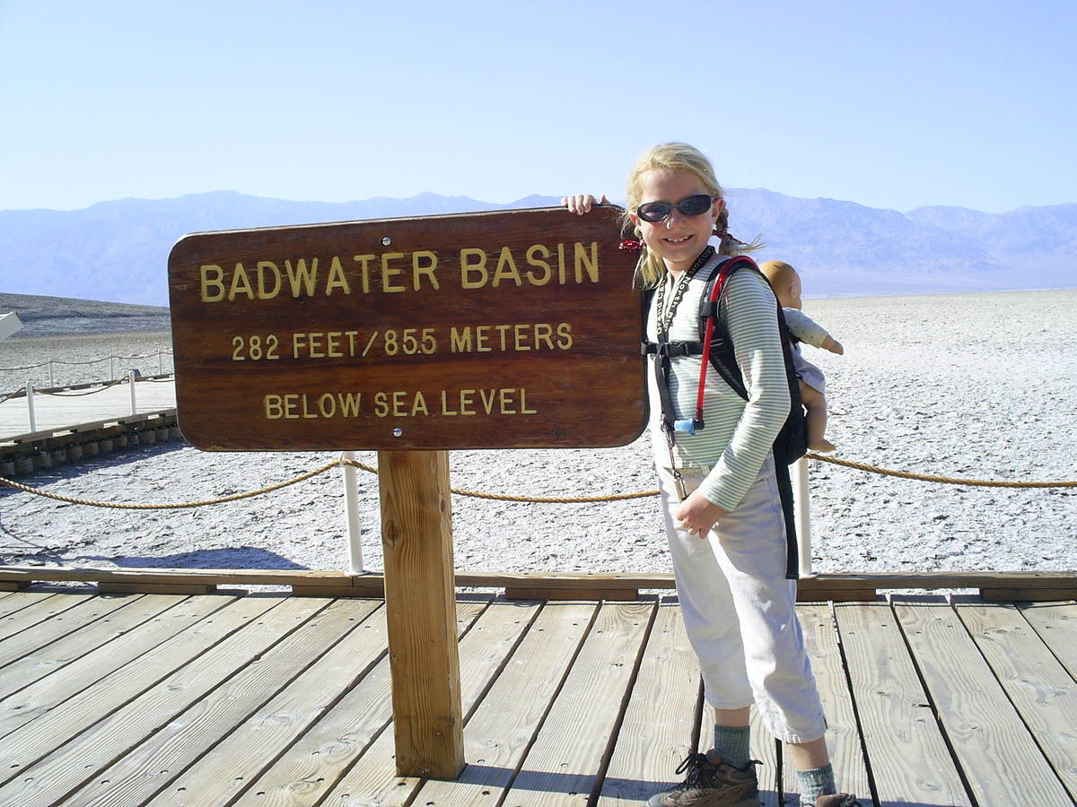 (Deborah Wall) Children should wear sunglasses when hiking in exposed areas, as this visitor is ...