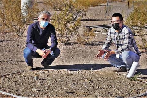 (DRI/Alison Swallow) Desert Research Institute scientists Markus Berli, Ph.D., left, and Yuan ...