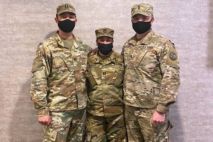 Nevada National Guard Boulder City resident U.S. Army Capt. Tana Gurule, center, helped saved a ...