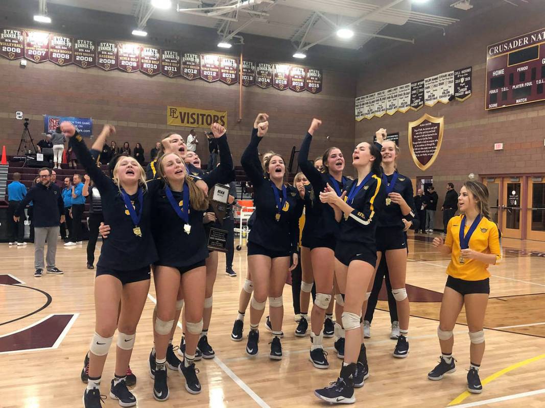 Members of the Boulder City High School girls volleyball team, which earned its third straight ...