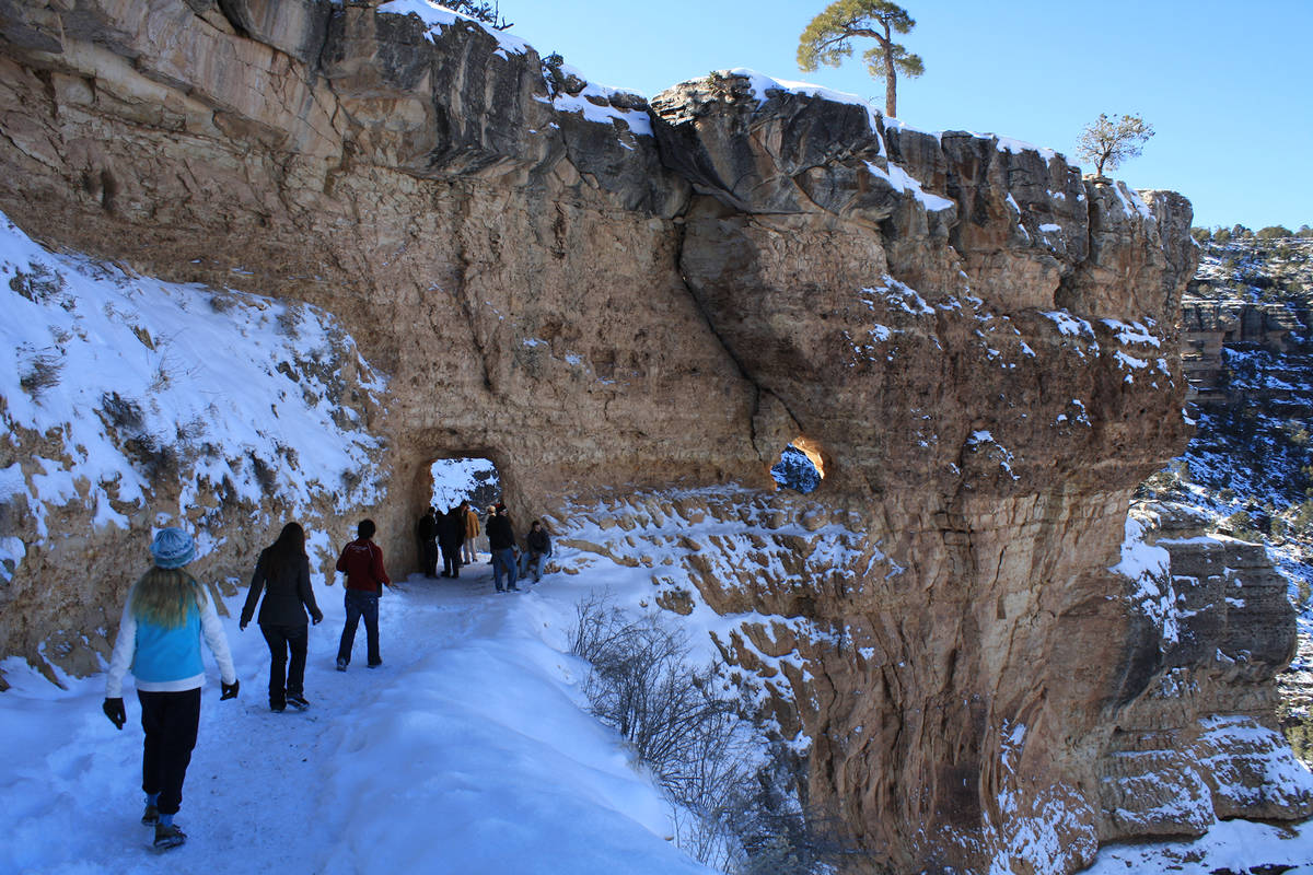 (Deborah Wall) Day hikers who come well prepared can hike down the Bright Angel Trail, even in ...