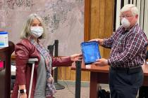 Boulder City Mayor Kiernan McManus presents the 21st annual Bill Andrews Award to Deborah Finne ...