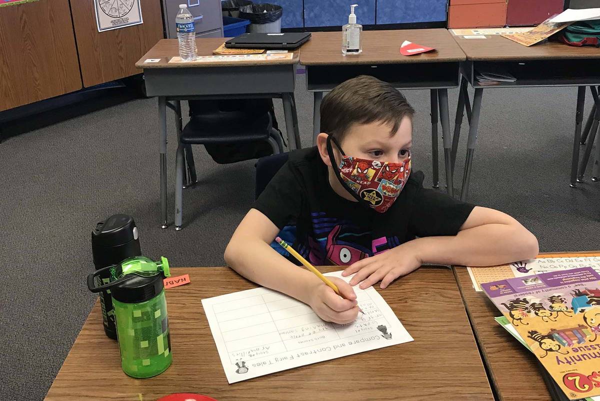 Benjamin Day Mitchell Elementary School second-grader Ty Quinlan is one of many Clark County Sc ...
