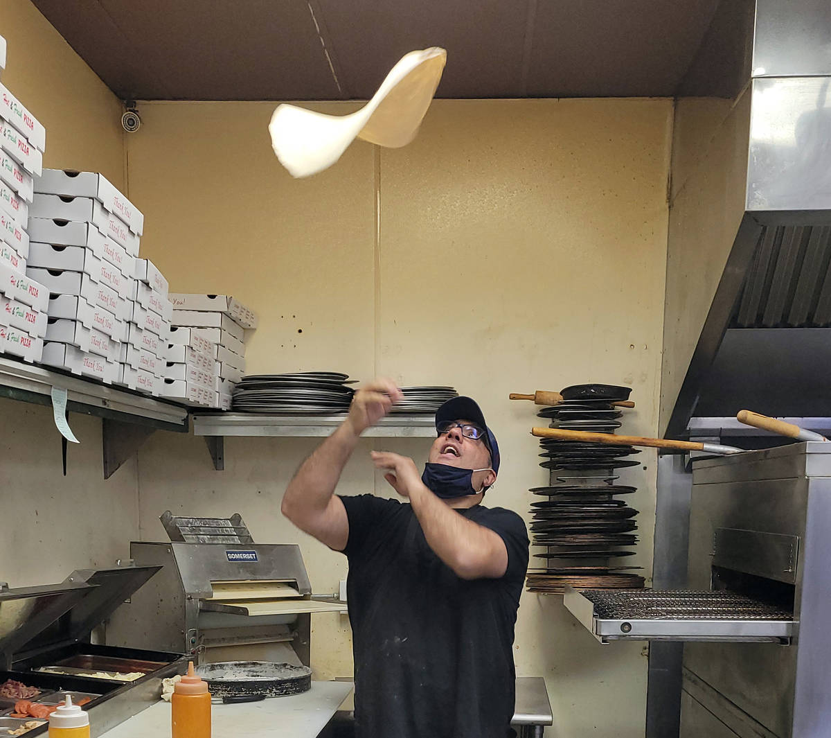 Celia Shortt Goodyear/Boulder City Review Vincenzo "Vinny" Cimino works his magic with a pizza ...