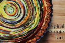 (Patti Diamond) Thinly sliced vegetables arranged in a spiral are the stars of this colorful tart.