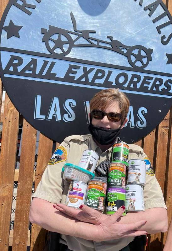 (Rail Explorers) Ann Inabnitt, supervisor of the Boulder City Animal Shelter, gathers up the fi ...