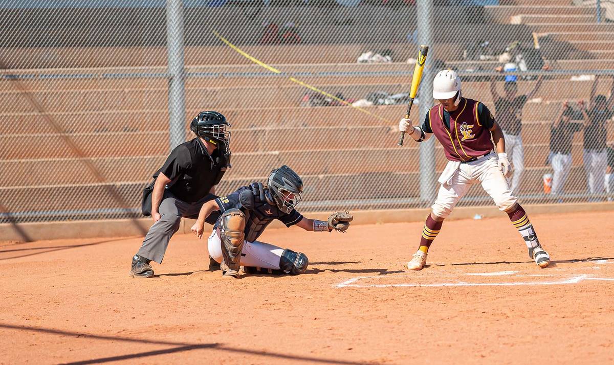 (Jamie Jane/Boulder City Review) Kenon Welbourne makes the catch at home plate in the Eagles’ ...