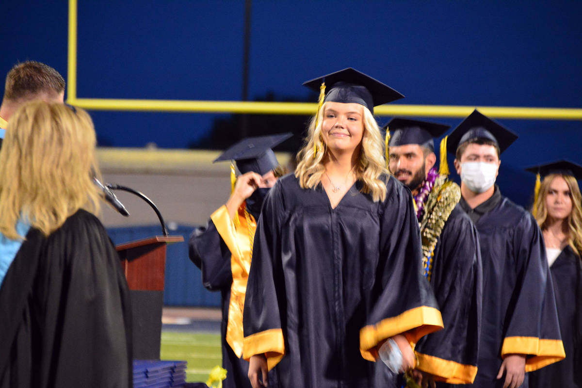 Celia Shortt Goodyear/Boulder City Review Emmaleigh Compton walks across the stage to receive h ...