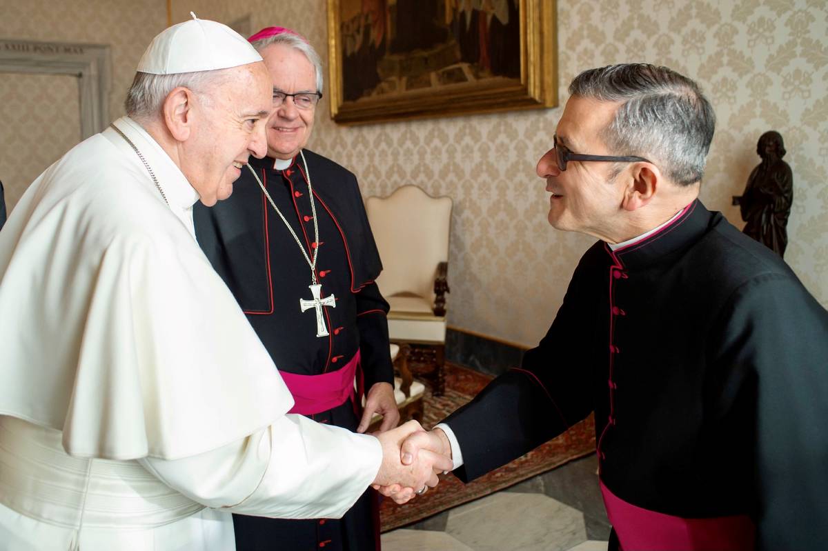 (L'Osservatore Romano) Msgr. Gregory Gordon, right, is seen in a January 2020 photo with Pope F ...