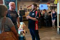 (Hali Bernstein Saylor/Boulder City Review) Mathew Fox, right, meets with supporters during a c ...