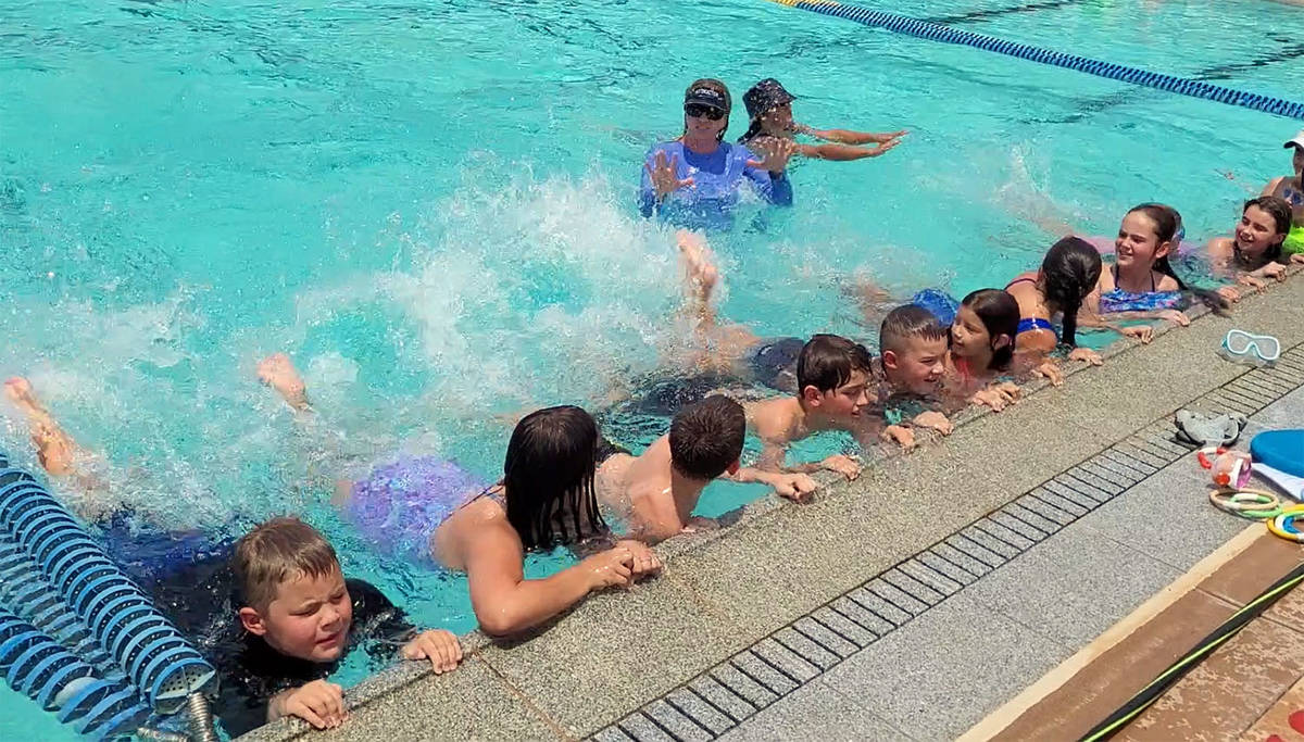 Celia Shortt Goodyear/Boulder City Review Swim instructor Colleen Fay takes participants throug ...