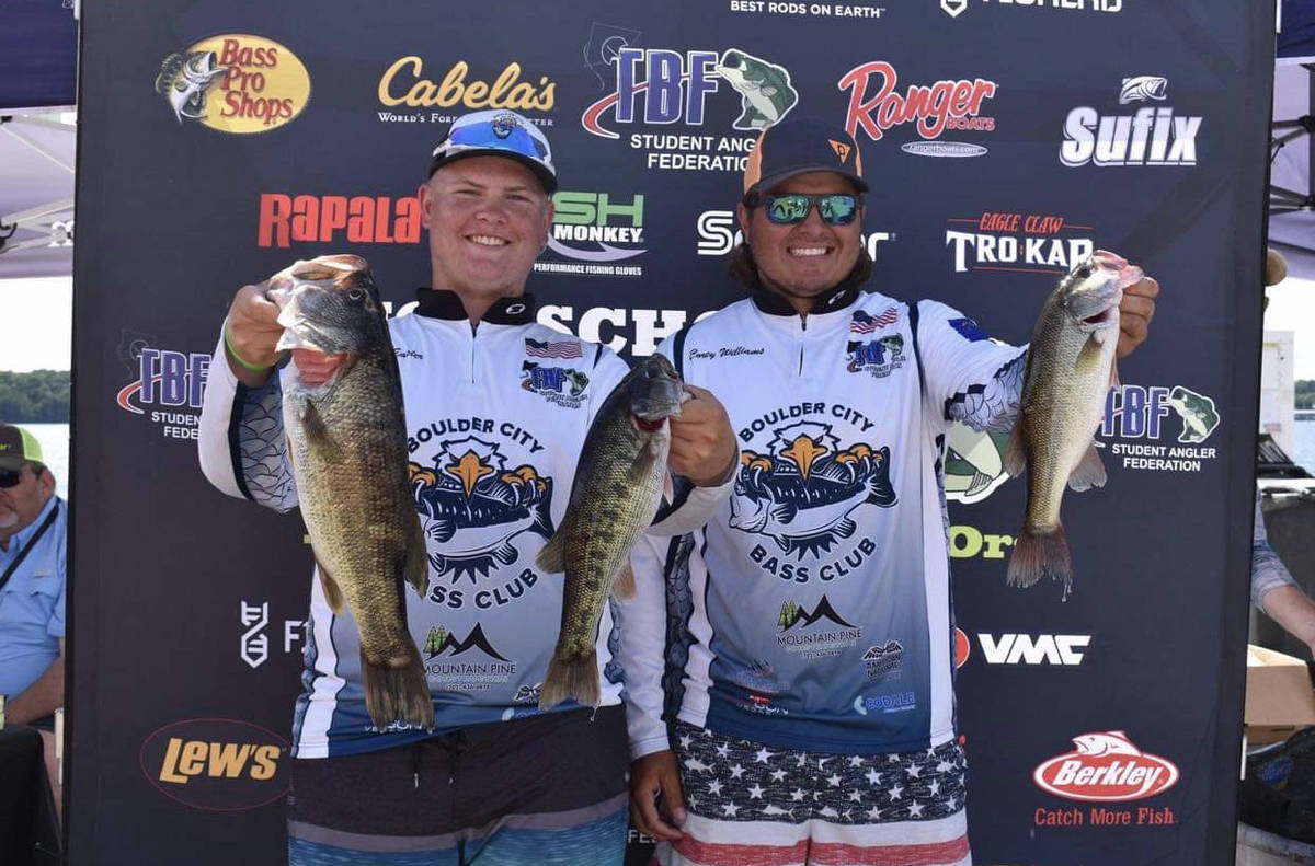 (Bri Osman Easter) Boulder City Bass Club members Izec Easter, left, and Corey Williams hold up ...