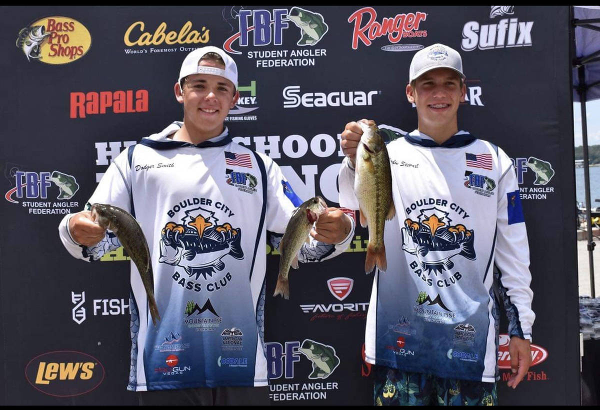 (Bri Osman Easter) Boulder City Bass Club members Dodger Smith, left, and Charlie Stewart hold ...