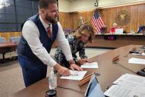 Celia Shortt Goodyear/Boulder City Review New councilmembers Matt Fox and Sherri Jorgensen sign ...