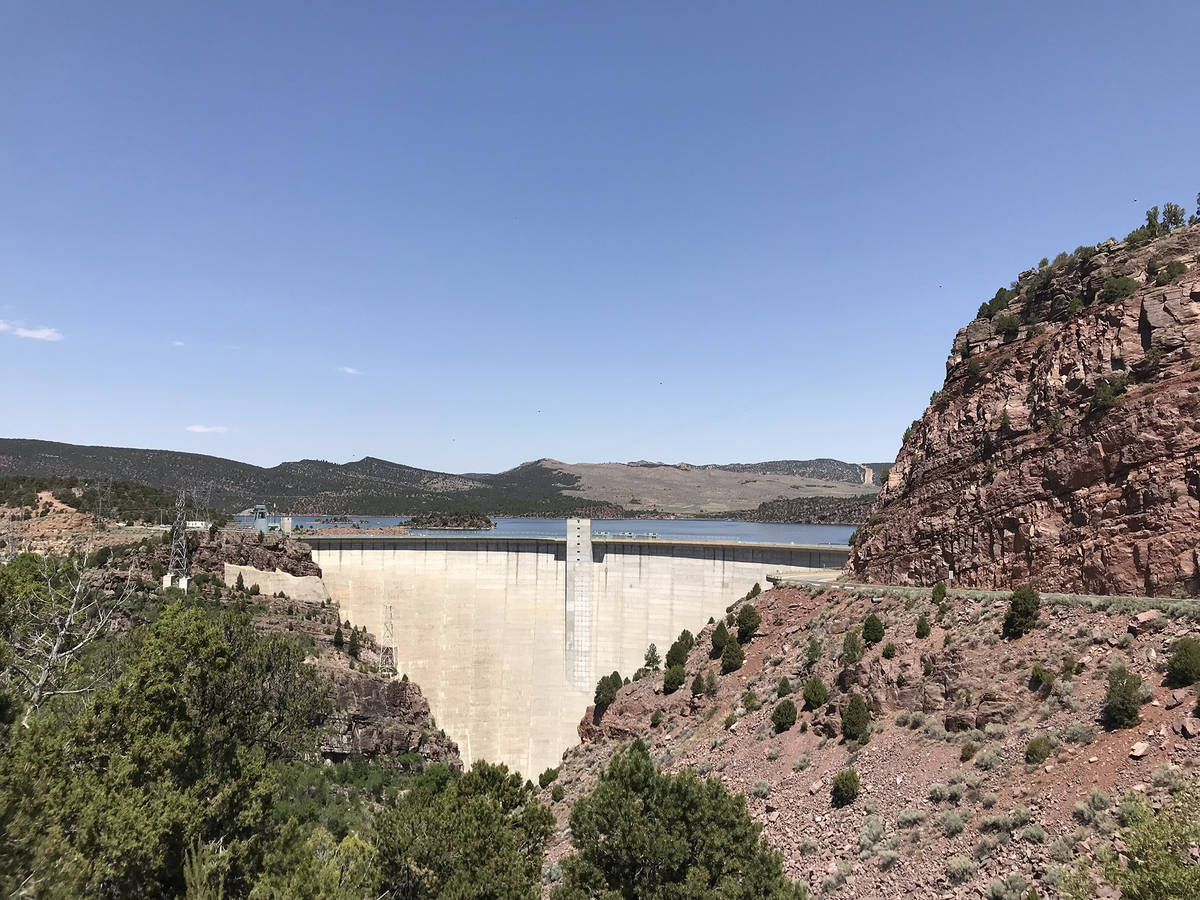 (Deborah Wall) The Flaming Gorge Dam, completed in 1964, impounded the Green River and created ...