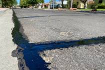 (Norma Vally/Boulder City Review) Sealing and repairing major cracks in the city’s roads can ...