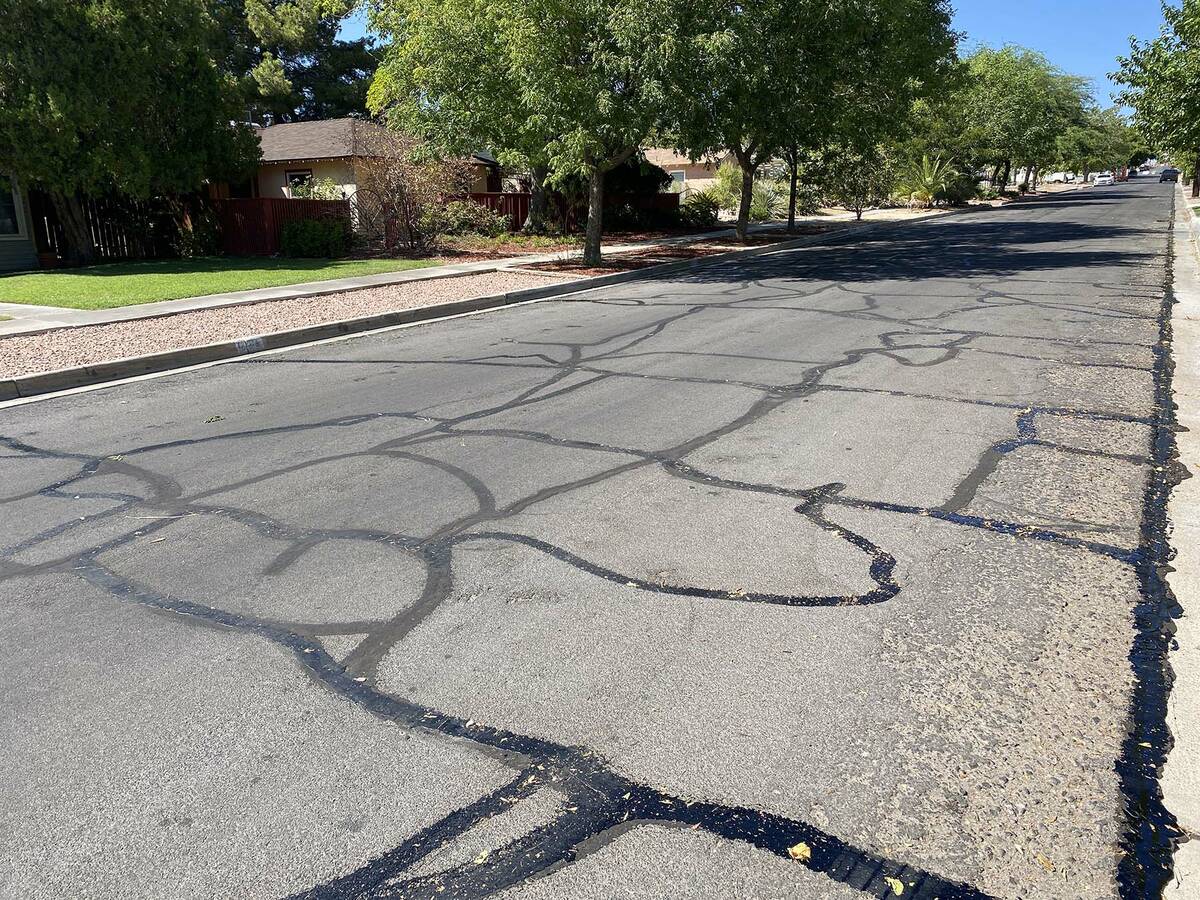 (Norma Vally/Boulder City Review) Sealing cracks on city streets will help prevent major damage ...
