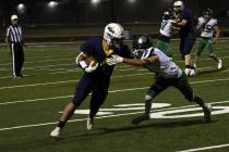 (Pernell Bryant/Boulder City Review) Boulder City High School junior Torryn Pinkard carries th ...