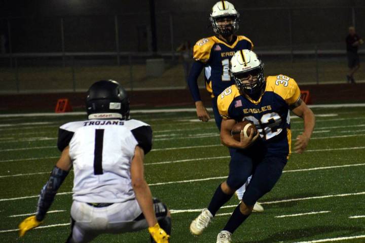 (Pernell Bryant/Boulder City Review) Boulder City High School junior Hunter Moore rushed for 14 ...