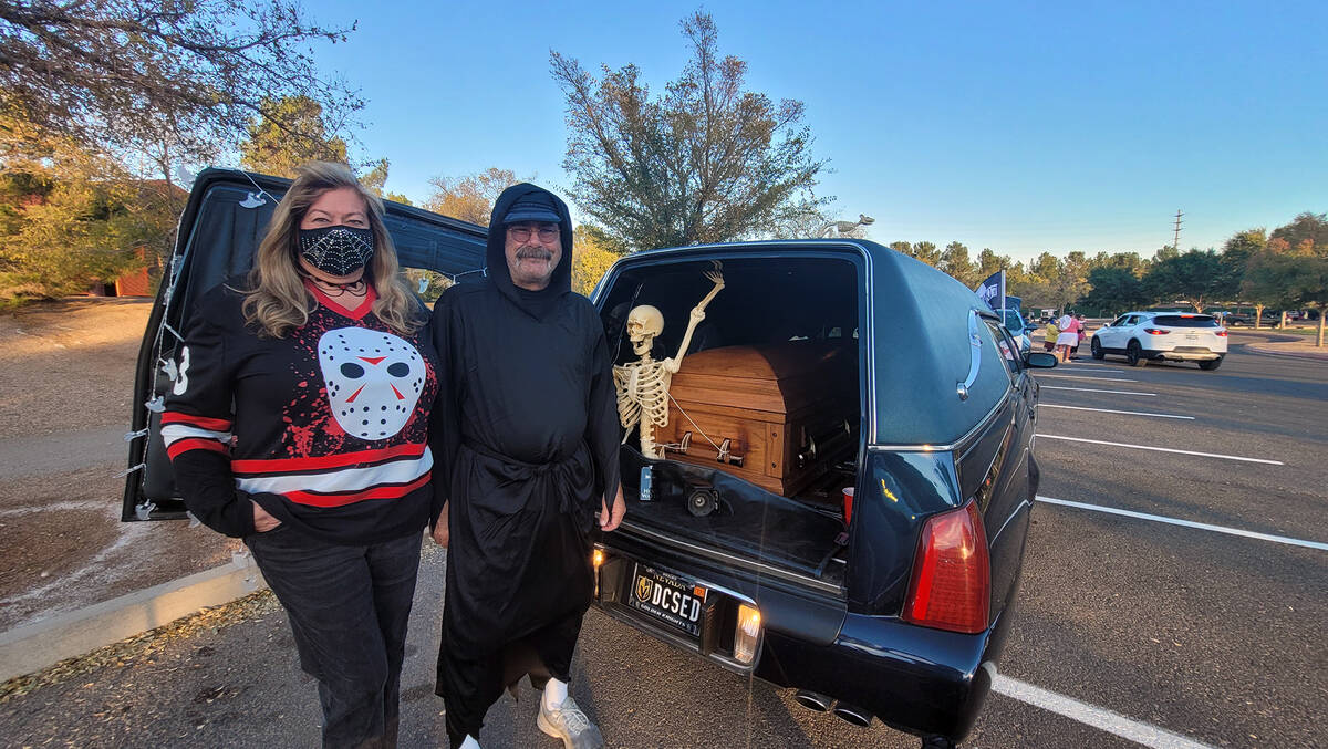 Celia Shortt Goodyear/Boulder City Review Sue Jaszkowski, her husband Lee and their skeleton fr ...