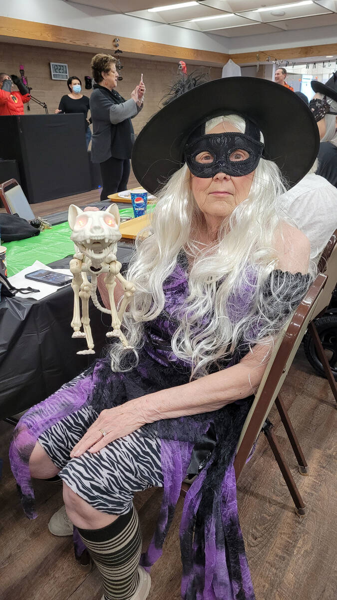 Celia Shortt Goodyear/Boulder City Review Bonnie Pfersching dressed as a witch for the ice "scr ...