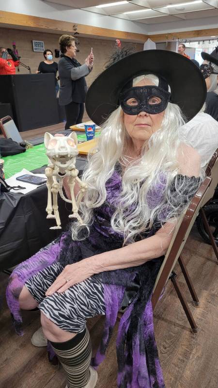 Celia Shortt Goodyear/Boulder City Review Bonnie Pfersching dressed as a witch for the ice "scr ...
