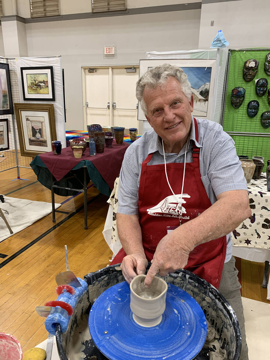 (Hali Bernstein Saylor/Boulder City Review) Ceramic artist Bill Rowe works on a cup during Boul ...