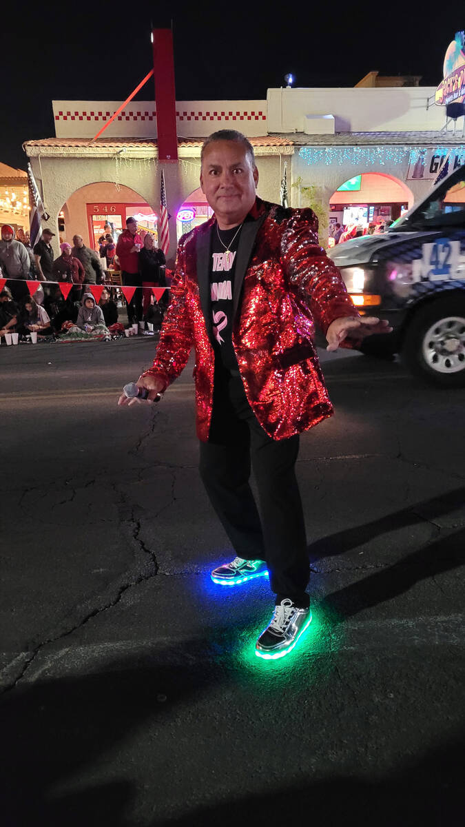 Celia Shortt Goodyear/Boulder City Review Mike Pacini emcees Santa's Electric Night Parade whil ...