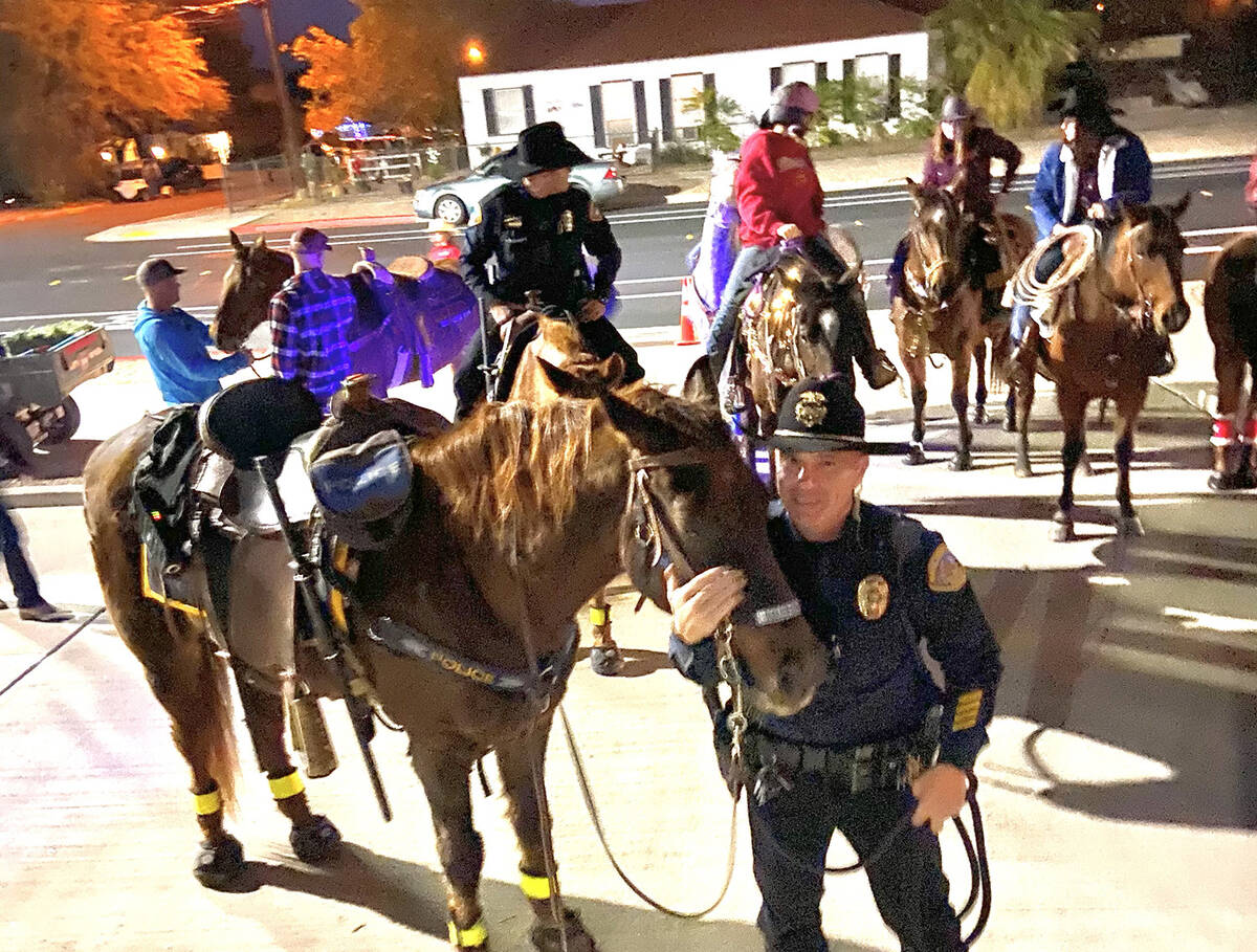 (Scott Pastore) Boulder City Police officer Scott Pastore posed with Odie, the first horse in t ...