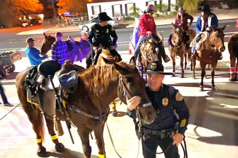 (Scott Pastore) Boulder City Police officer Scott Pastore posed with Odie, the first horse in t ...