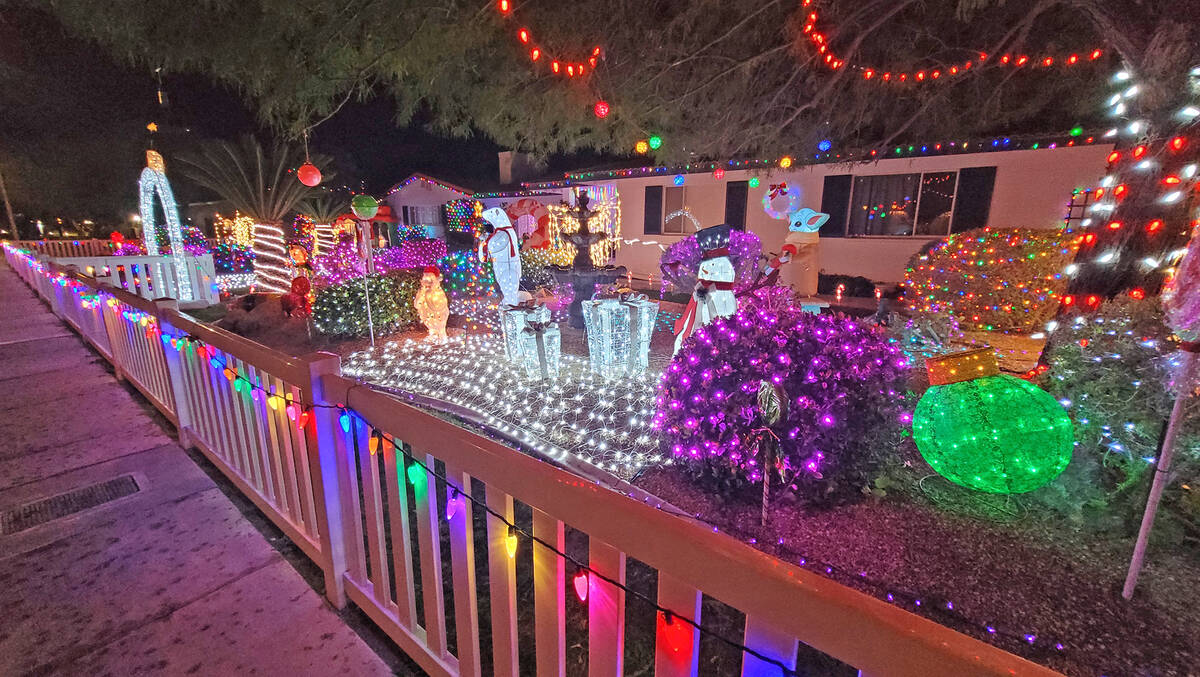 Homes throughout Boulder City, including this one at 1415 Fifth St., feature festive Christmas ...