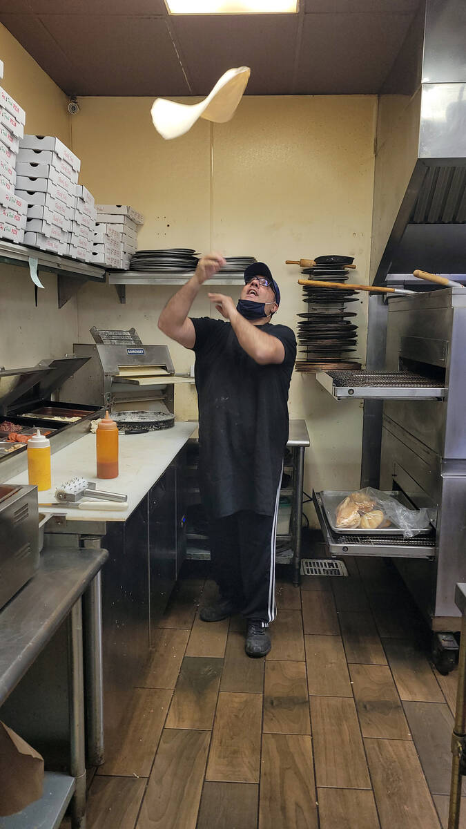 (Celia Shortt Goodyear/Boulder City Review) Vincenzo "Vinny" Cimino works his magic with a pizz ...