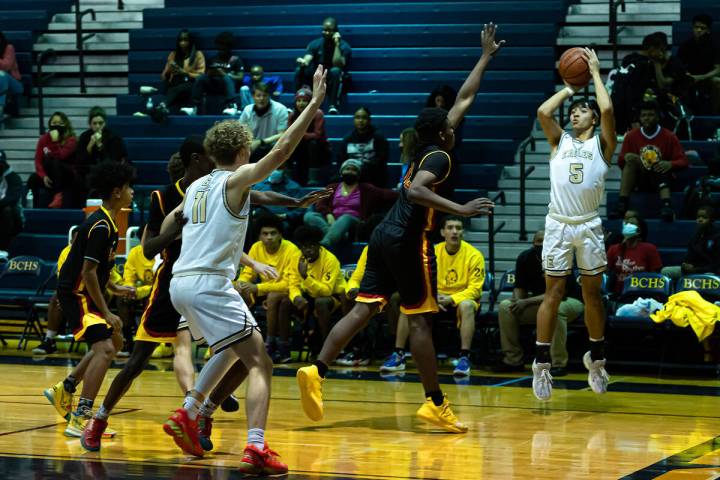 (Jamie Jane/Boulder City Review) Senior Martin Thompson, right, seen in action for the Boulder ...