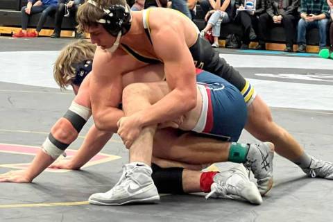 (Alex Moore) Boulder City High School junior Hunter Moore, seen grappling against an opponent f ...