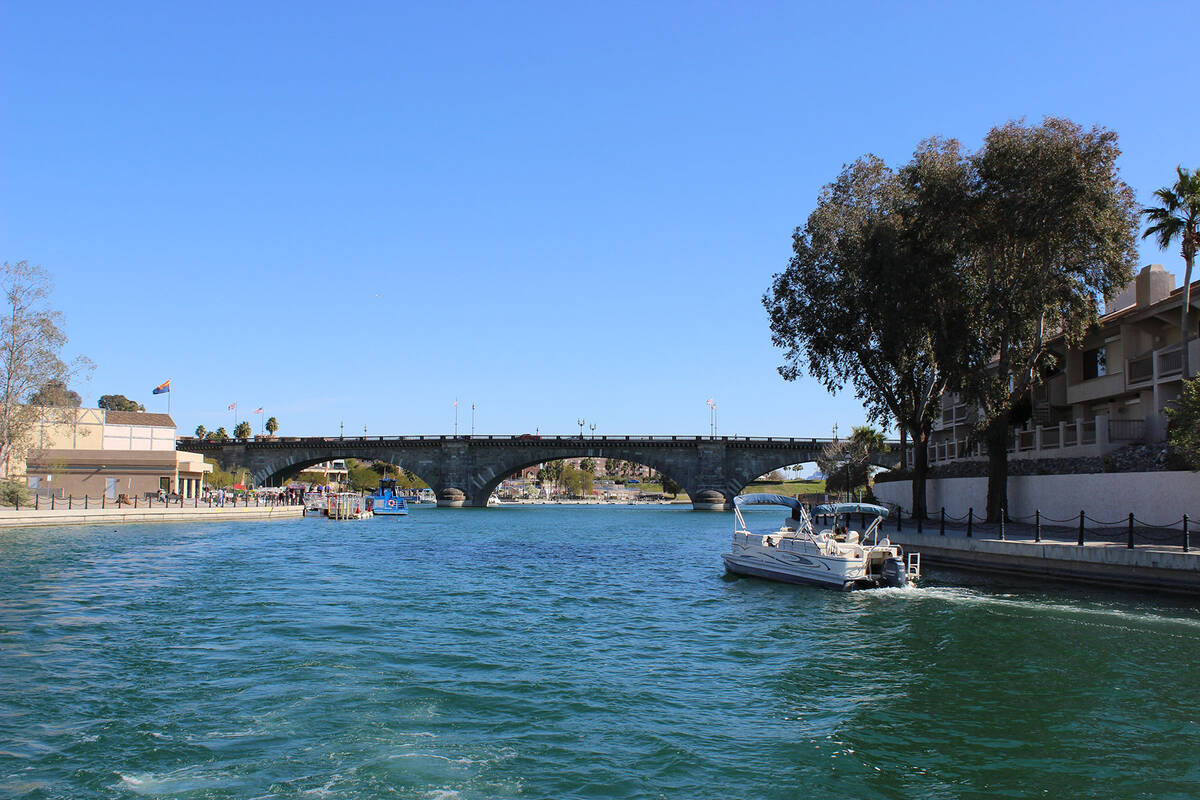 (Deborah Wall) The 930-foot bridge spans a man-made canal from Lake Havasu City to a 3,500 acre ...
