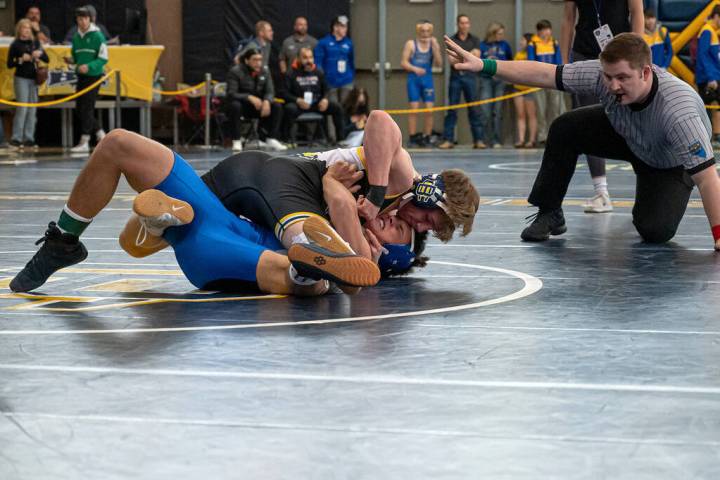 (Jamie Jane/Boulder City Review) Boulder City High School senior Josh Fotheringham wrestles an ...