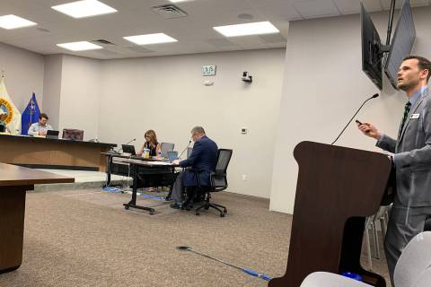 (Hali Bernstein Saylor/Boulder City Review) City Manager Taylour Tedder, right, spoke about his ...