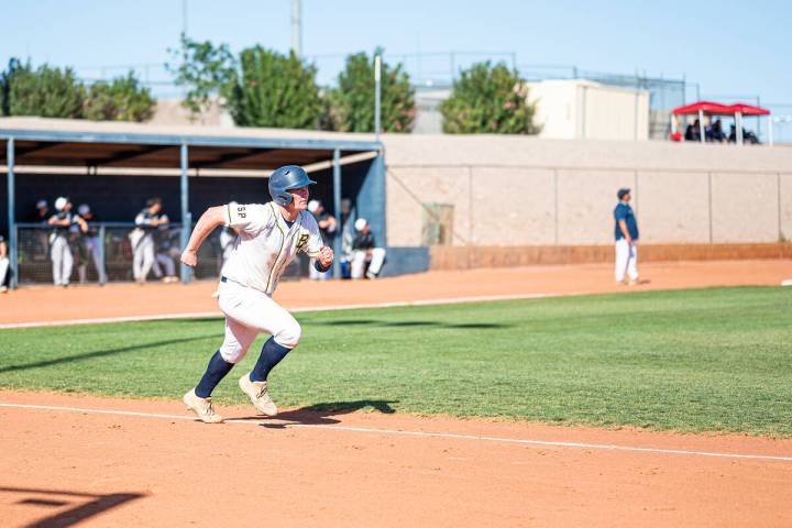 (Jamie Jane/Boulder City Review) Boulder City High School junior Caleb Brown heads for first ba ...