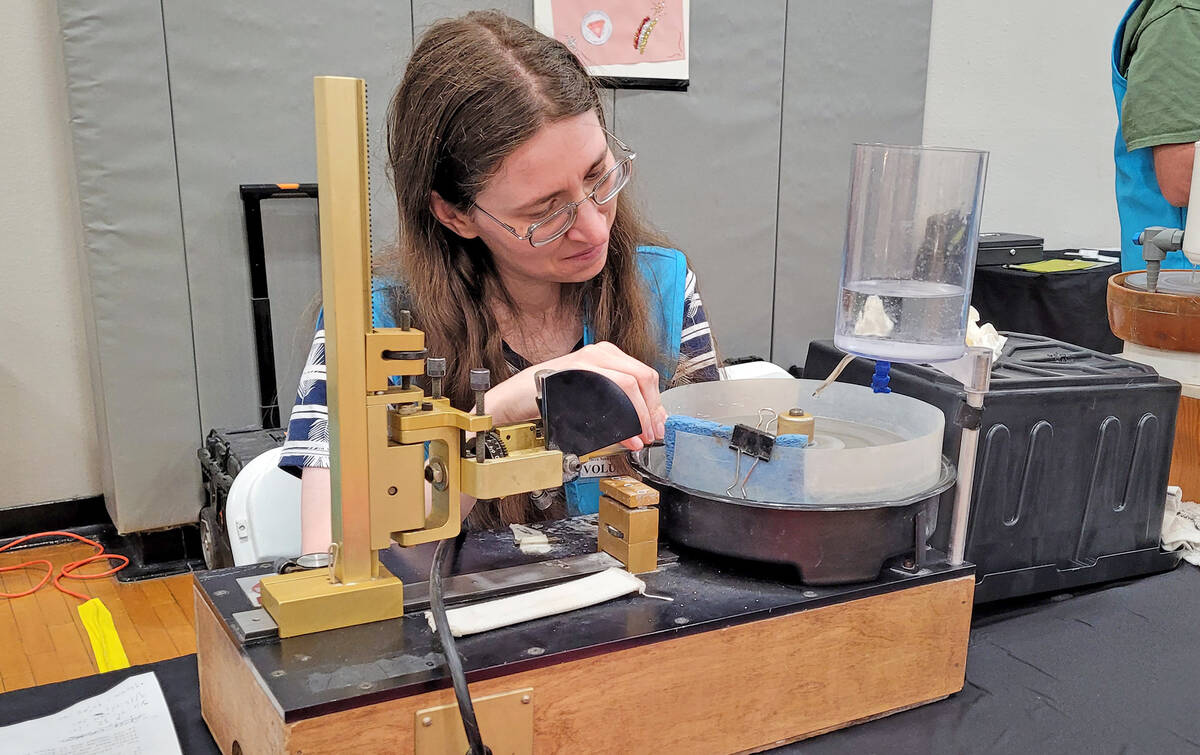 Celia Shortt Goodyear/Boulder City Review Elaine Fortuna works on faceting a stone at the South ...