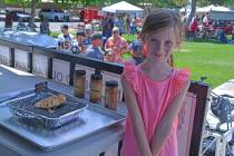 Celia Shortt Goodyear/Boulder City Review Six-year-old Harper King shows off the chicken she co ...