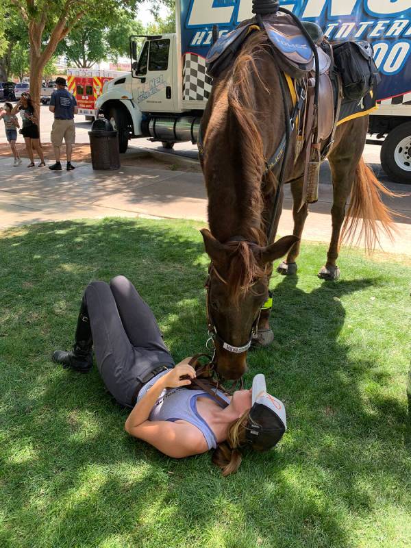 (Hali Bernstein Saylor/Boulder City Review) Emma Ford shares a quiet moment with Odie, who was ...